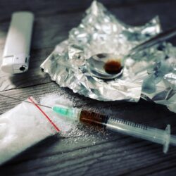 Syringe and Cooked Heroin